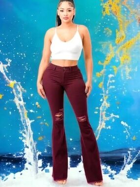 NEW. Stretch Mid-rise Burgundy Bellbottom Jeans with Frayed Hem. Size MEDIUM